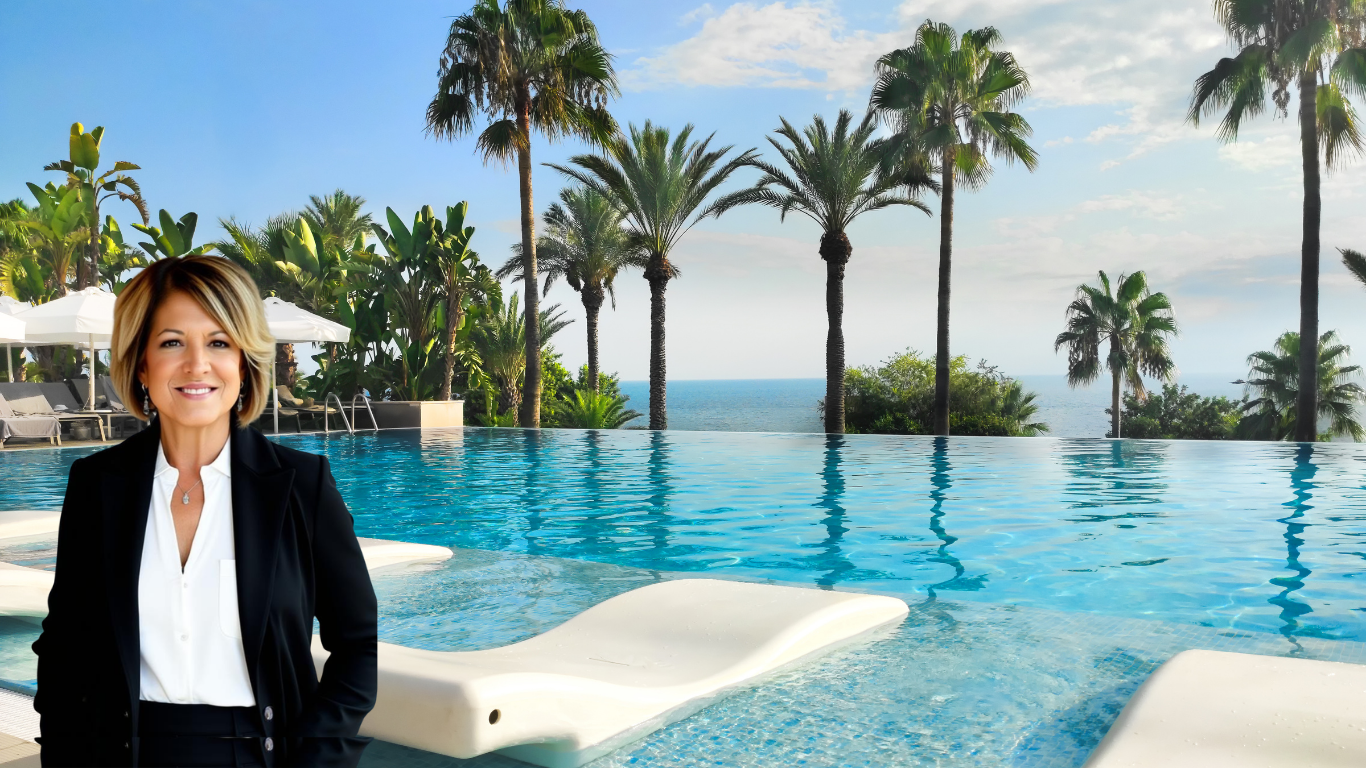 Julie Papagni at a luxury infinity pool in Sarasota, Florida