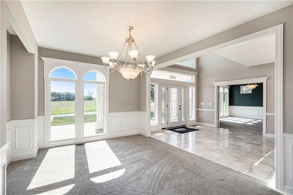 Grand entry with chandelier