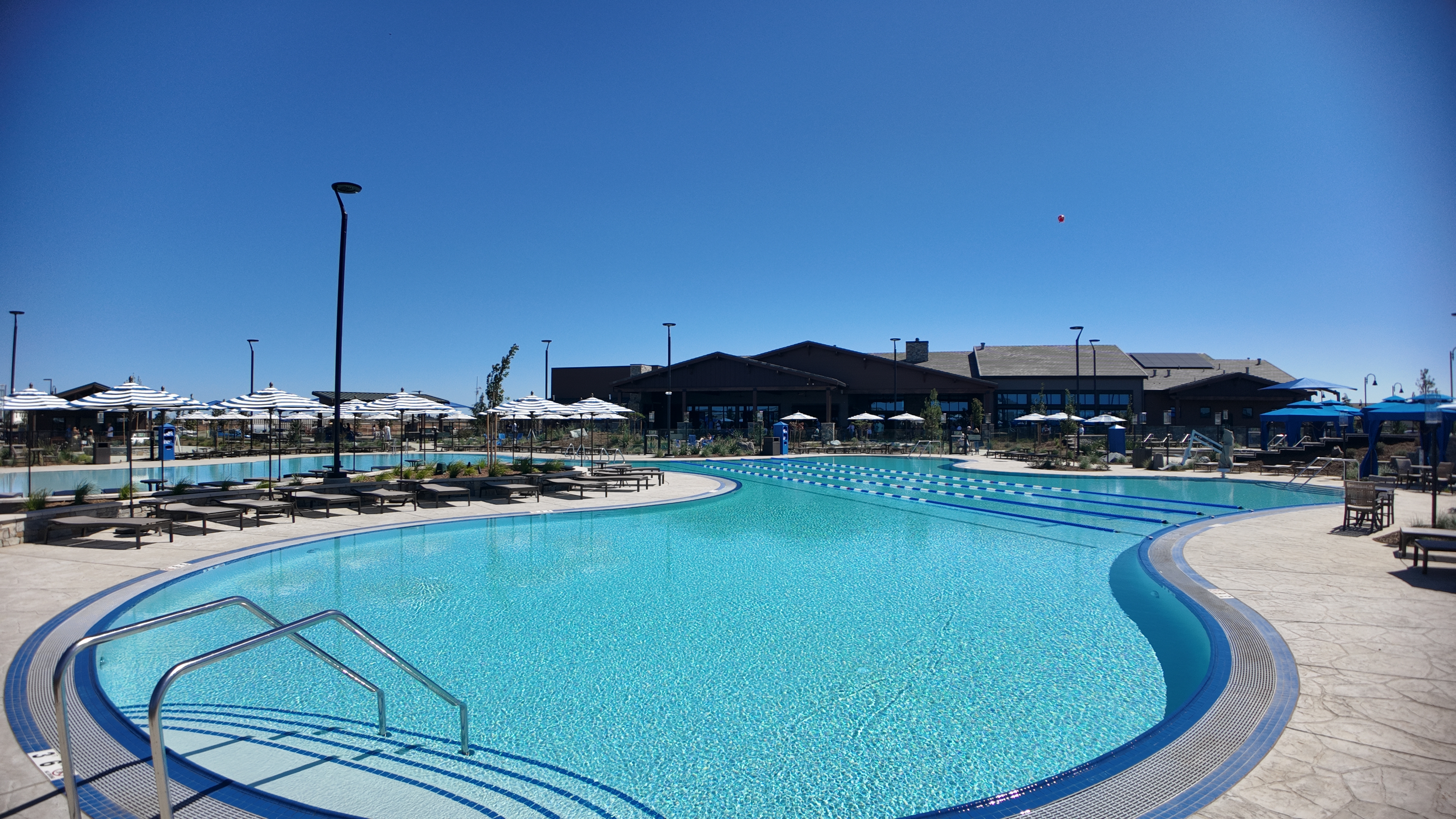 The resort-style pool with cabanas at Esplanade at Madeira Ranch in Elk Grove