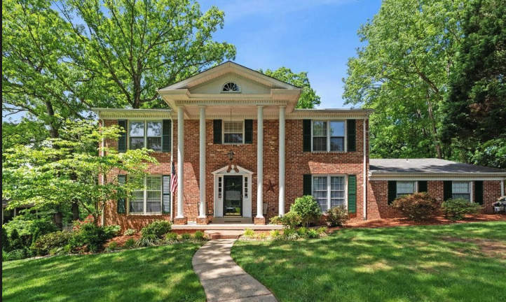 Historic downtown Manassas Virginia with charming brick storefronts and tree-lined streets