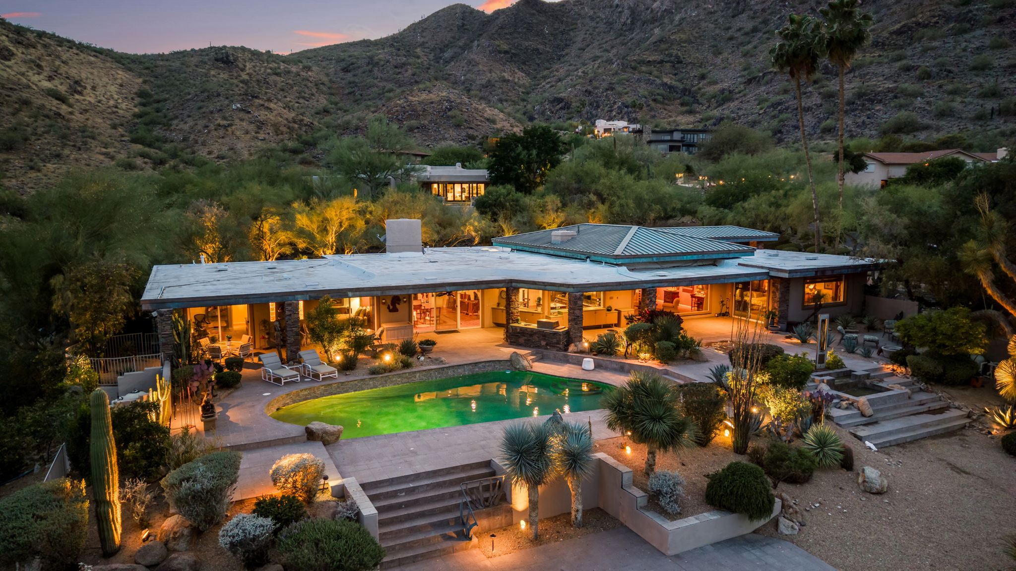 Exterior view of 8219 N Charles Drive, a Dave Hanson hillside estate in Paradise Valley with sweeping valley vistas