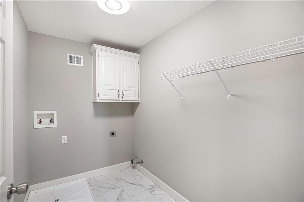 Laundry room with storage