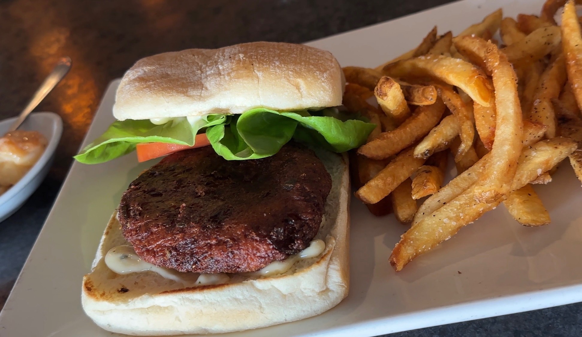 Crab cake sandwich with fries at Aqua Terra Bistro in downtown Buford Georgia