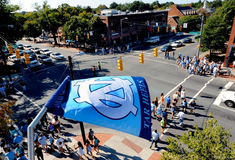 UNC Carolina Blue flag hanging on Franklin Street in Chapel Hill NC