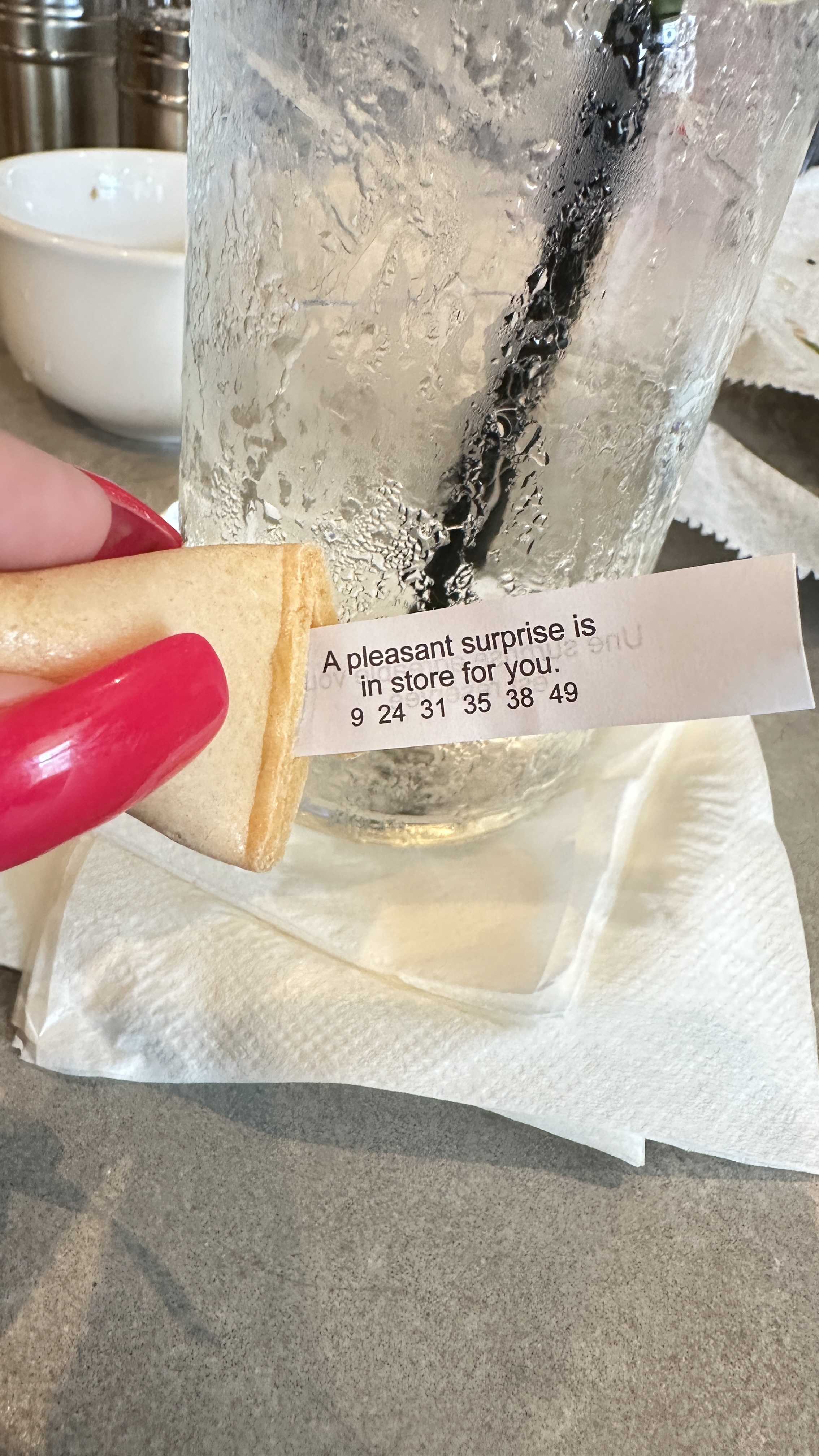 Broken fortune cookie reading A pleasant surprise is in store for you at Taqueria Tsunami in Gainesville Georgia