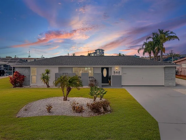 Waterfront home at 12809 4th Isle, Hudson FL — pending accepting backups