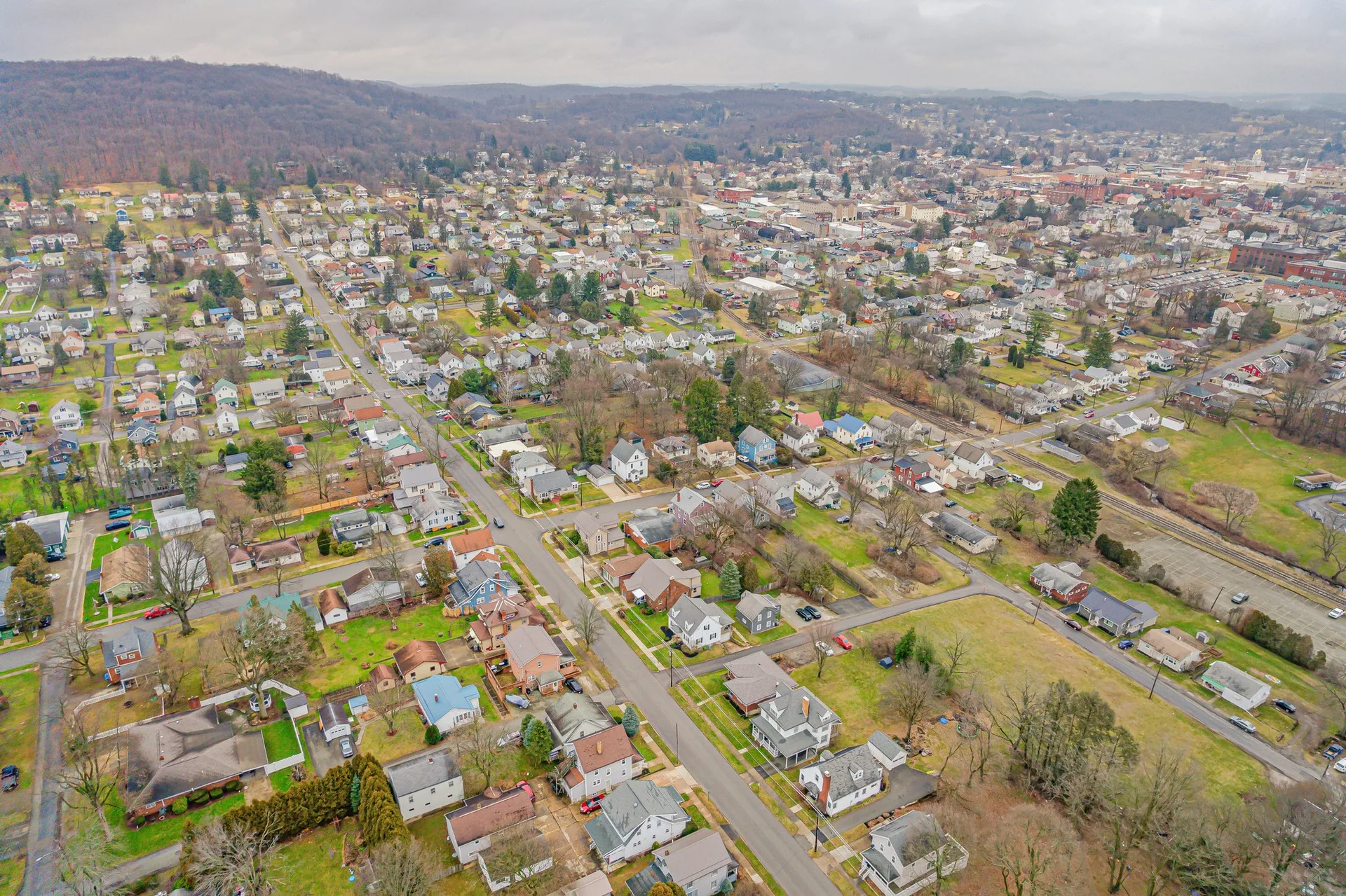 Aerial view of Indiana, PA showcasing the town's residential areas and surrounding hills