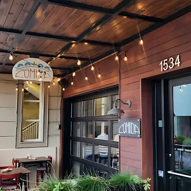 Comida SRQ restaurant exterior on State Street in downtown Sarasota, photographed by Kim Donahue