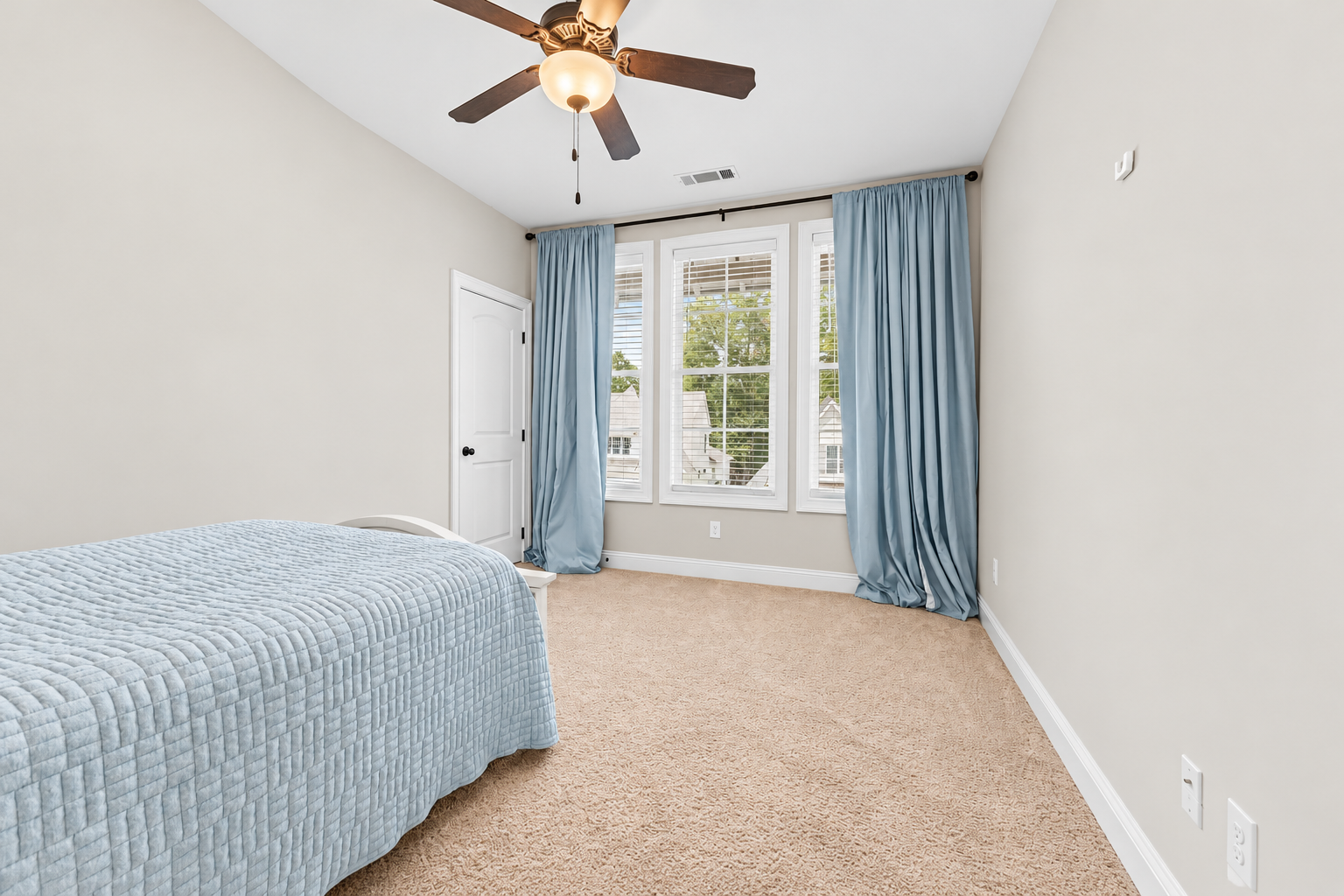 Bright neutral bedroom interior at 1537 Dartmouth Dr, Auburn AL