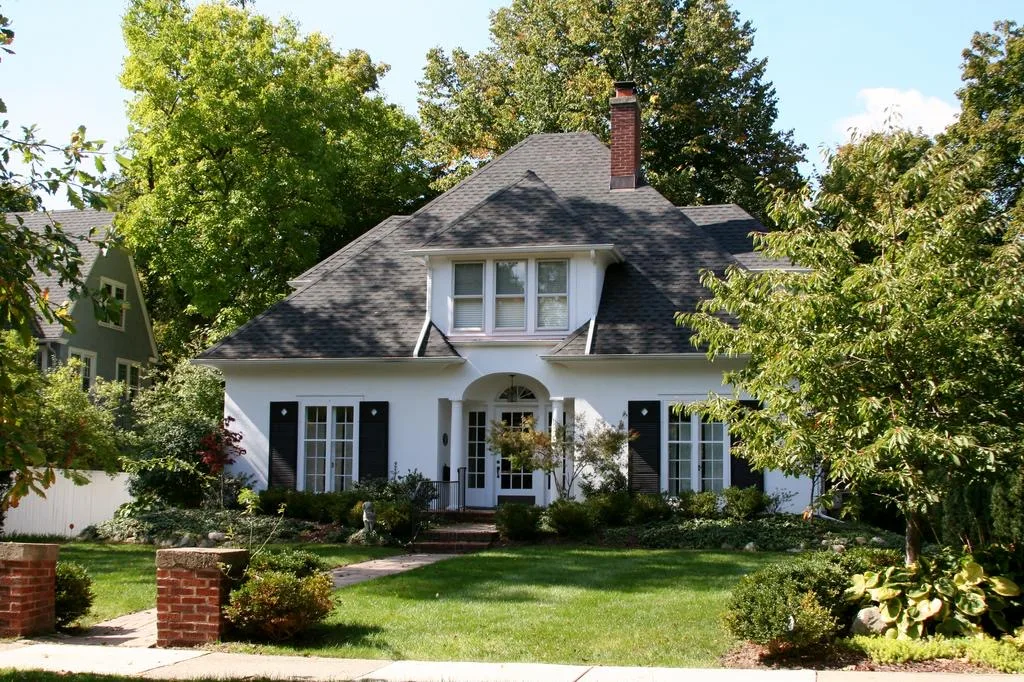 White home with black shutters in Ann Arbor