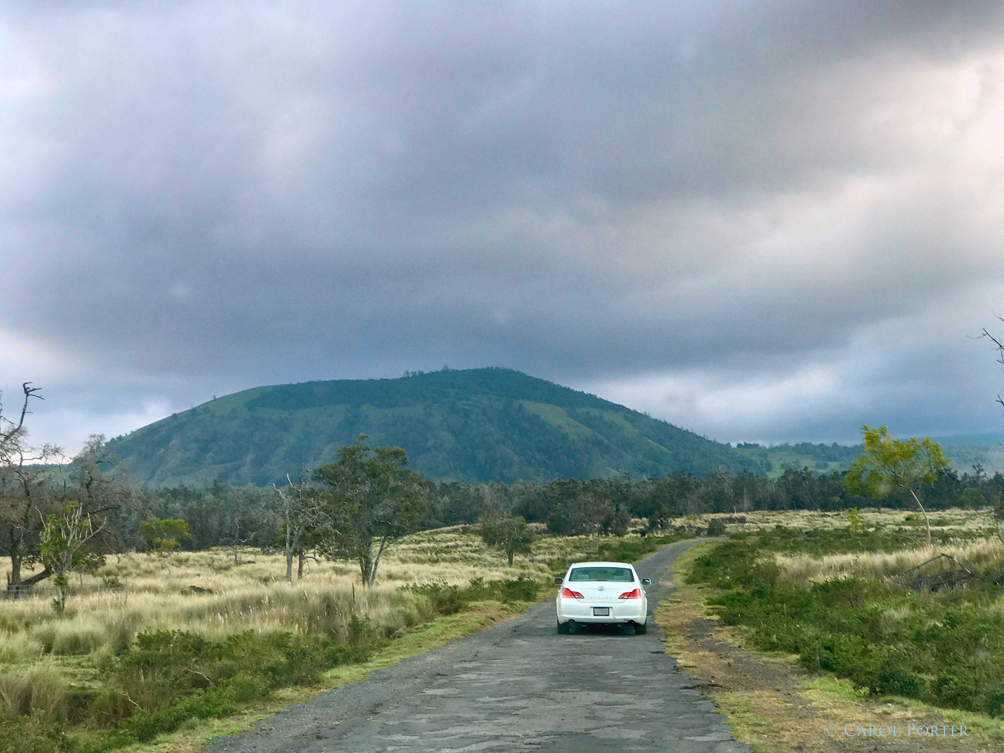 Driving into the ranch, toward the cinder cone that everyone who lives here recognizes