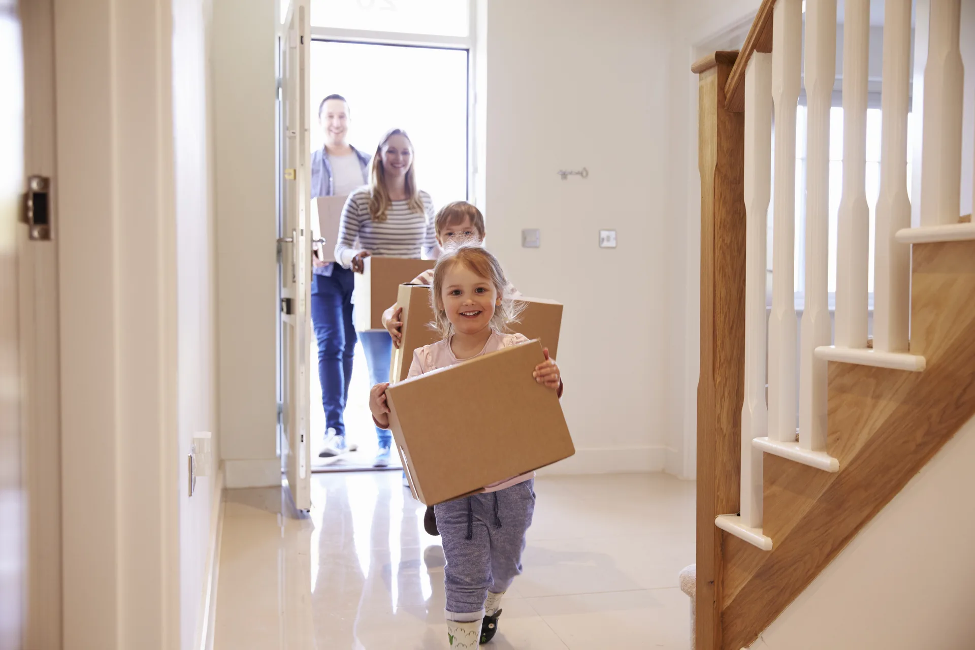 A family moving into their new home