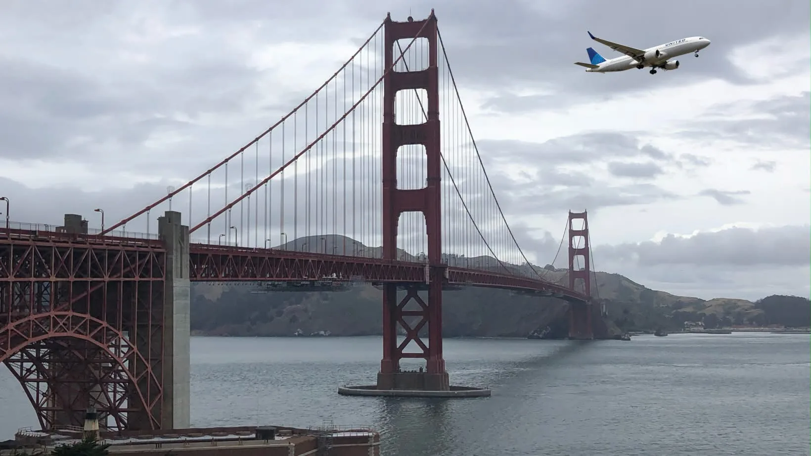 Golden Gate Bridge spanning San Francisco Bay with a commercial airplane in the sky above, capturing San Francisco and pilot life in one frame