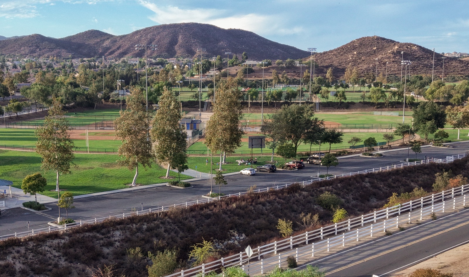 Los Alamos Hills Sports Park in Murrieta with green fields and hills