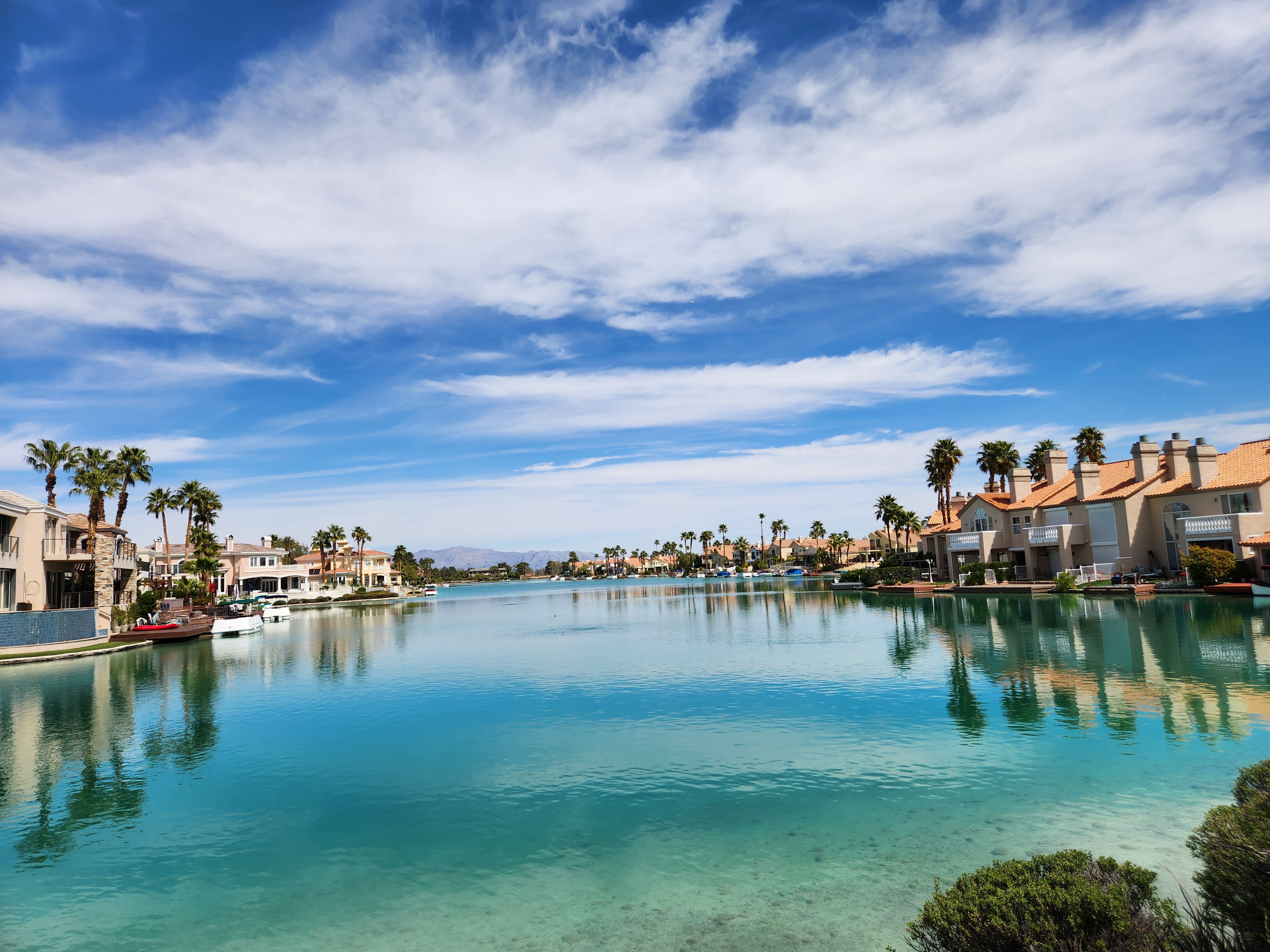 Waterfront community in The Lakes, Las Vegas at sunset