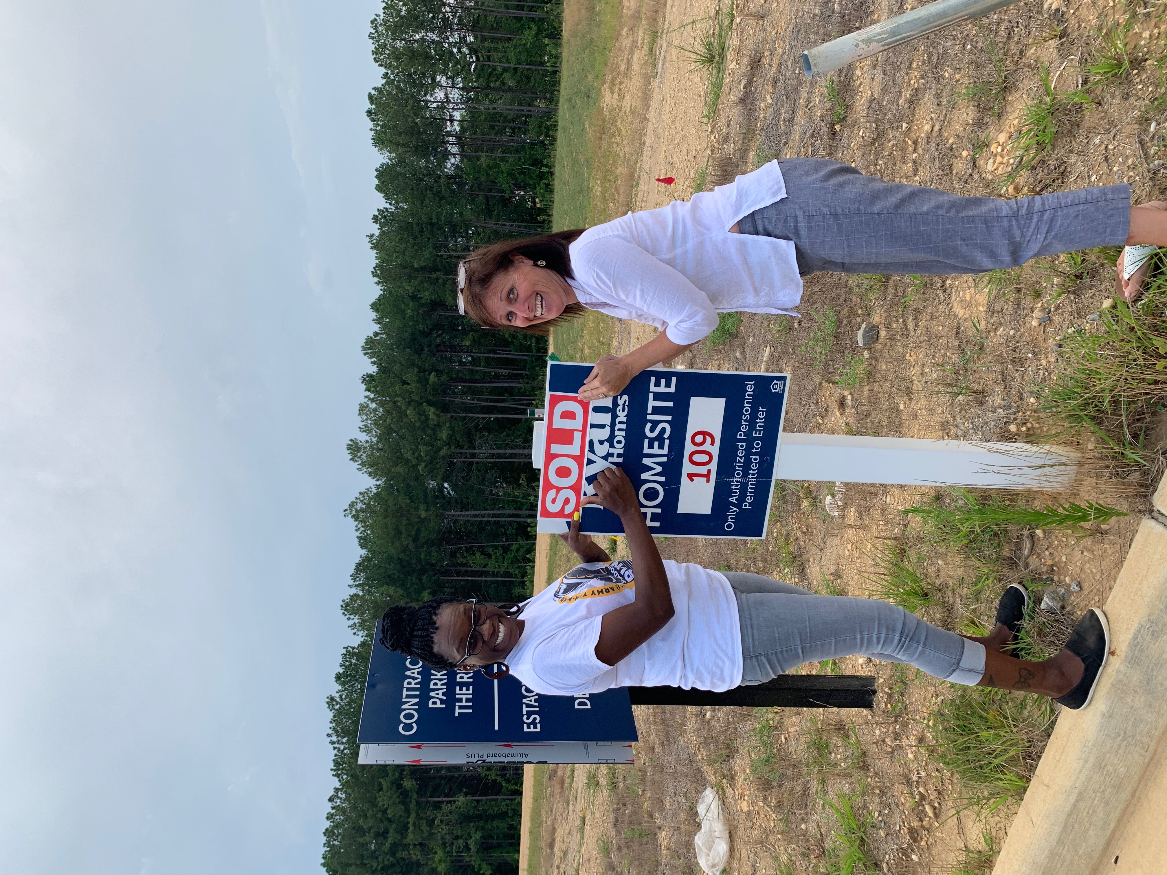 Client photo — successful home sale celebration