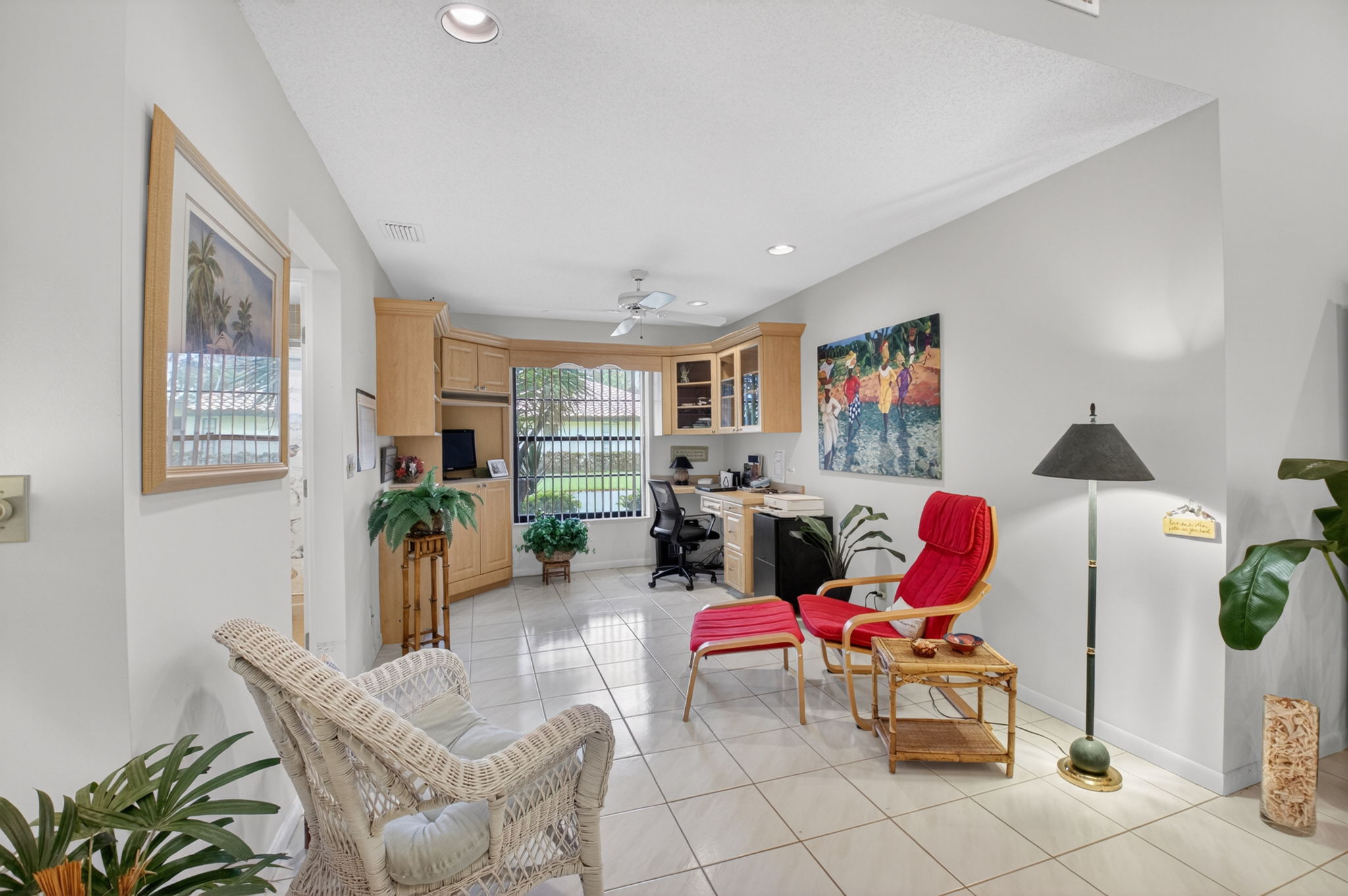 Living room at 10039 Andrea Lane A with skylights and open floor plan