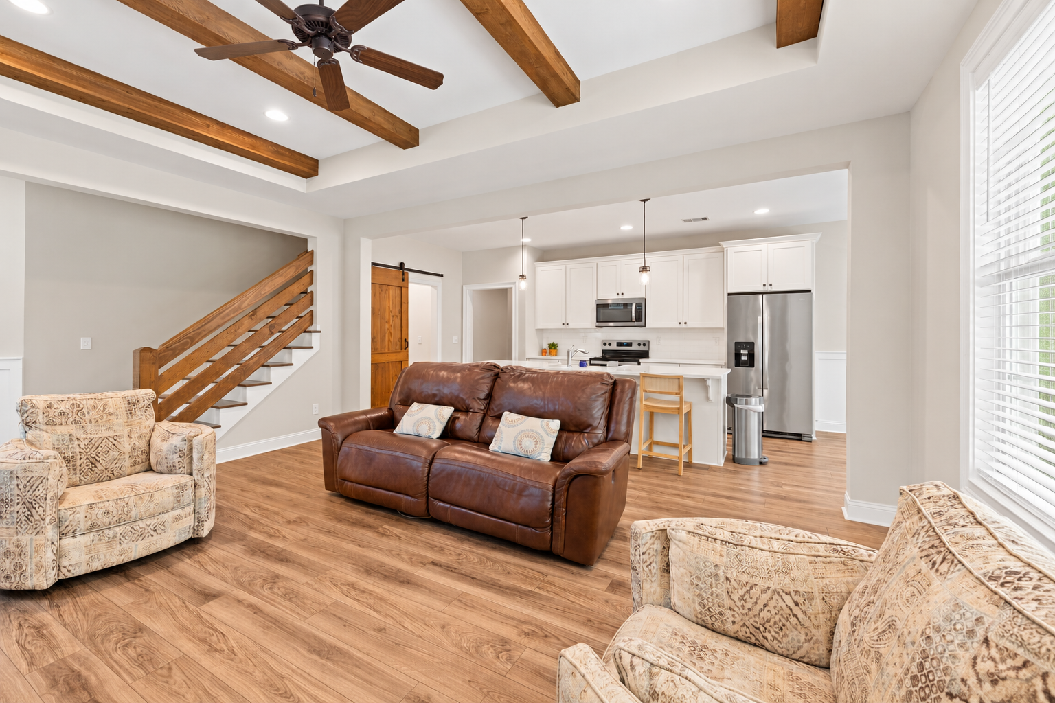 Bright farmhouse living room and seating at 1537 Dartmouth Dr, Auburn AL