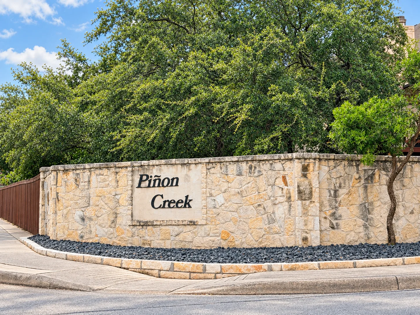 The Piñon Creek neighborhood entrance sign