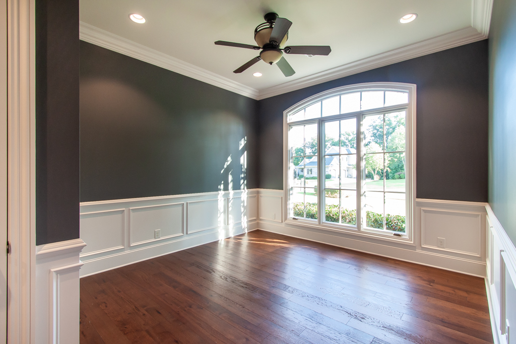 Living room seating area with hardwood floors