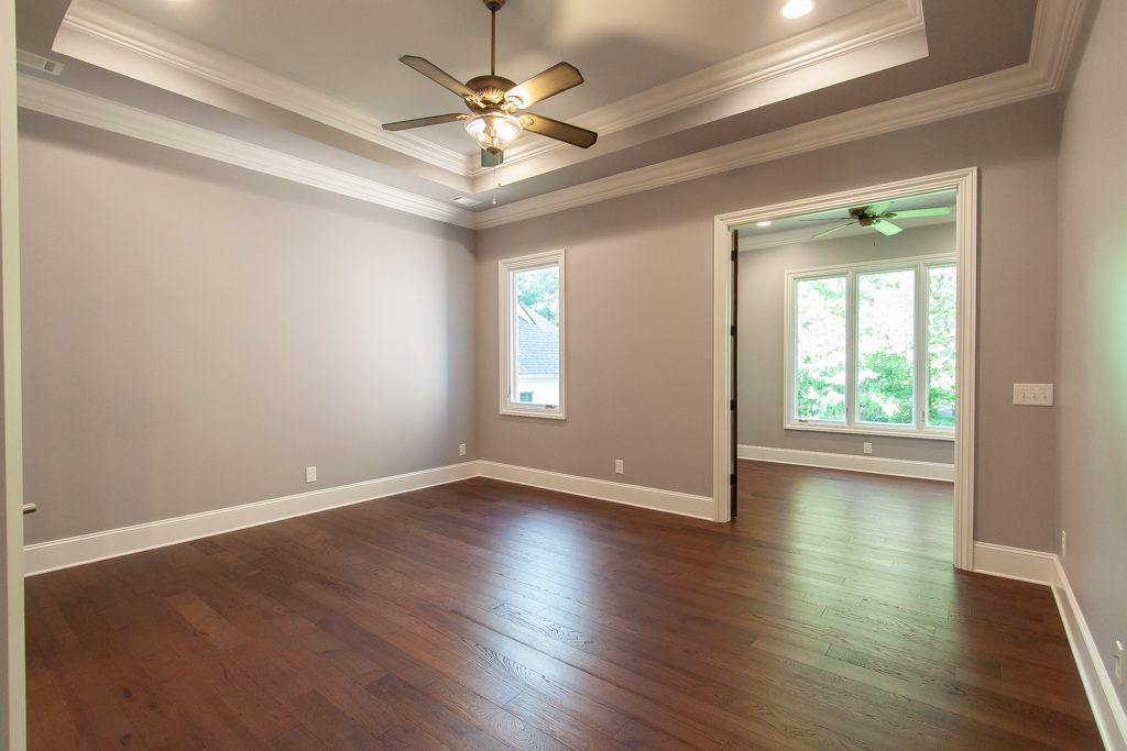 Living room with fireplace and built-in shelving