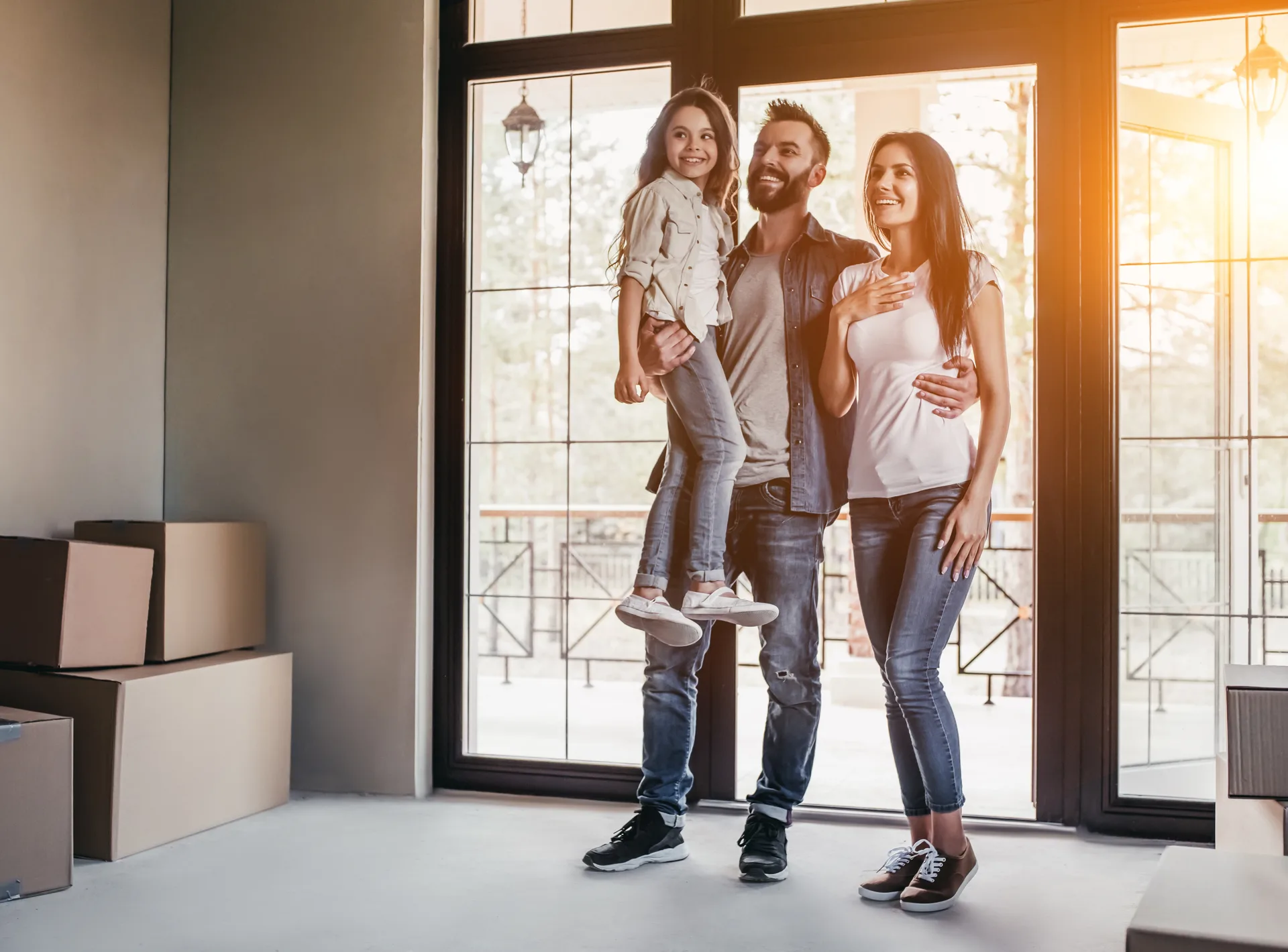 A family enjoying their first moments in their new home