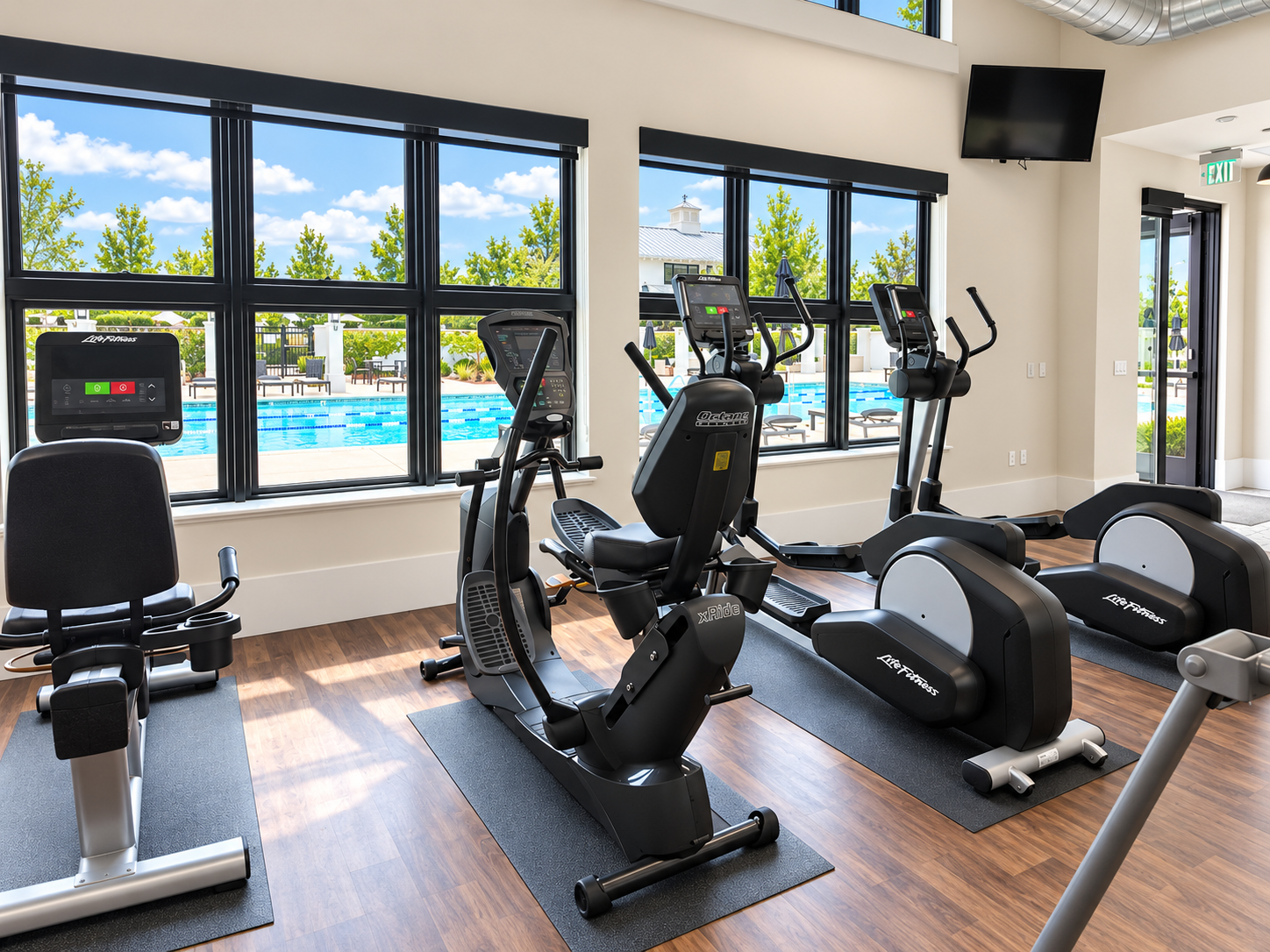 Cardio equipment with pool views in the fitness center at Club Liberty, Summit at Liberty, Rio Vista