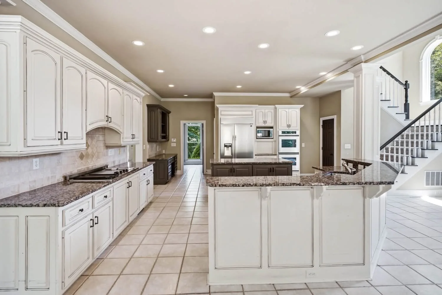 Interior view of 2115 Tee Drive showing living space with golf course views