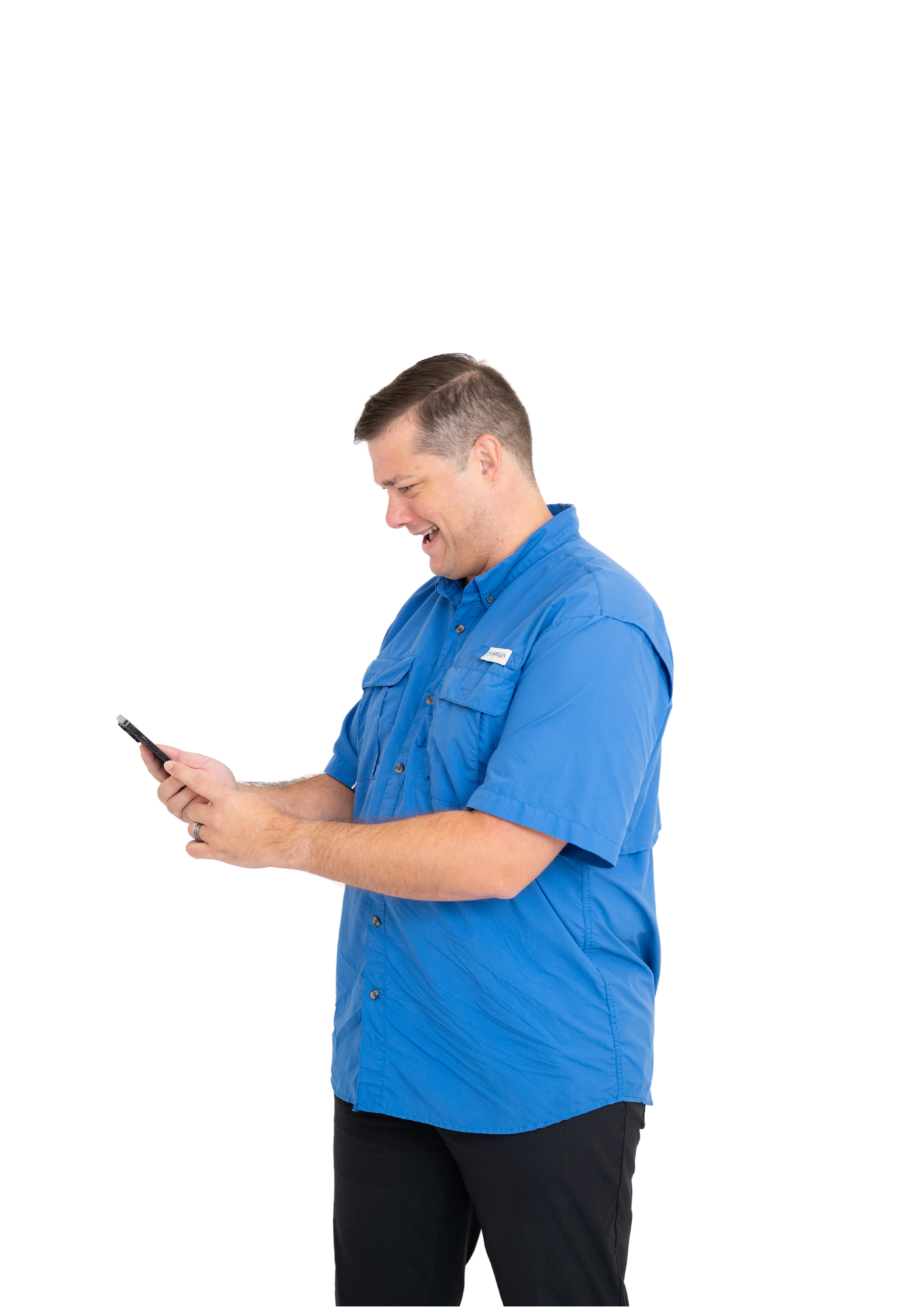 Tyler Gibson looking at his phone