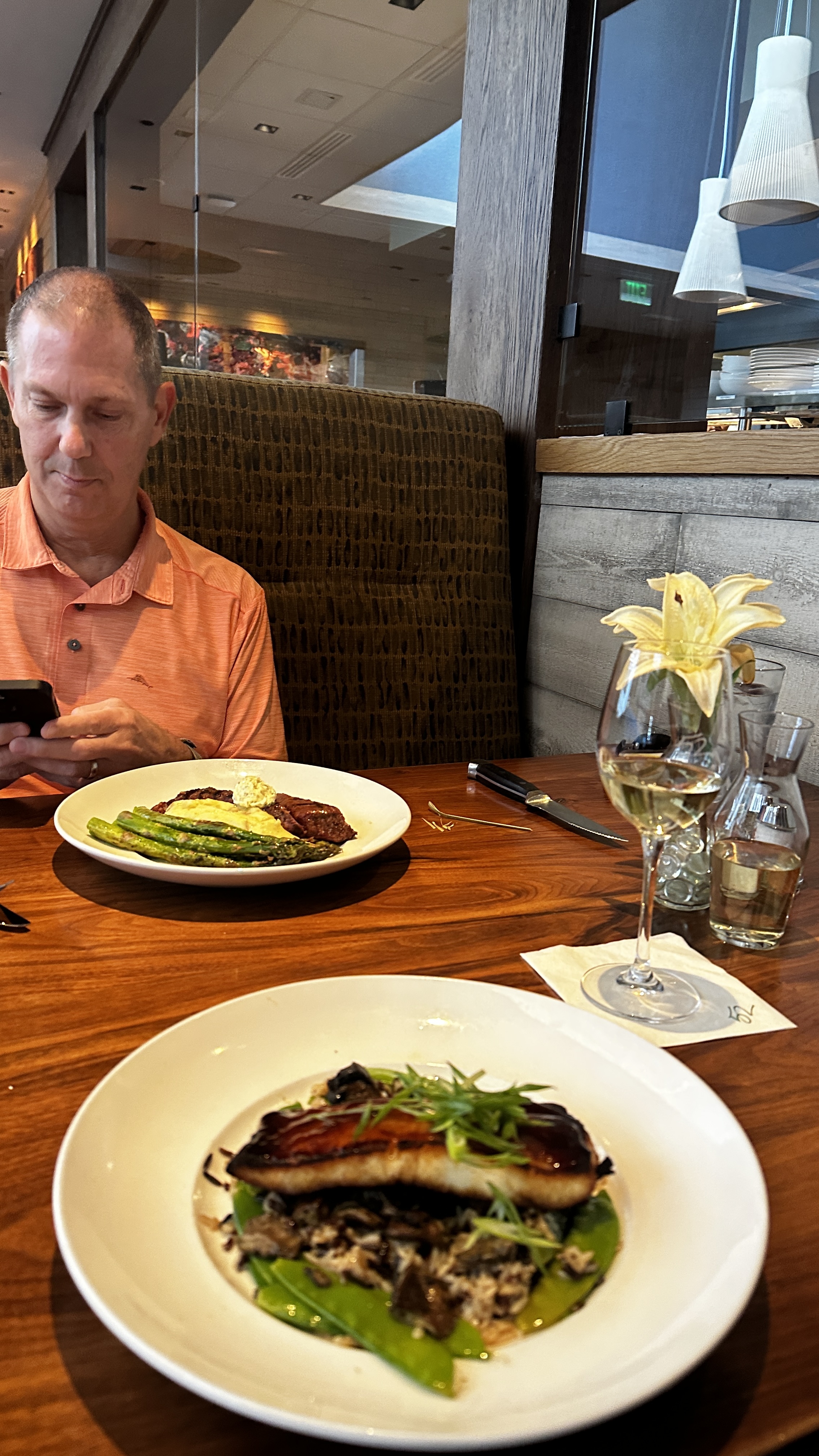 Sea bass and veal entrée plates at Seasons 52 restaurant in Buford Georgia