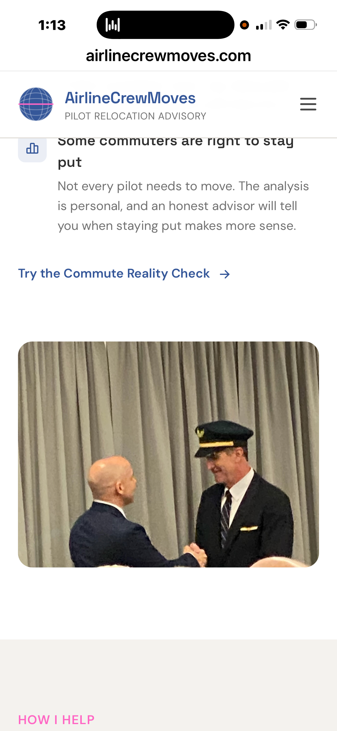 A pilot in uniform shaking hands with a colleague in a professional setting