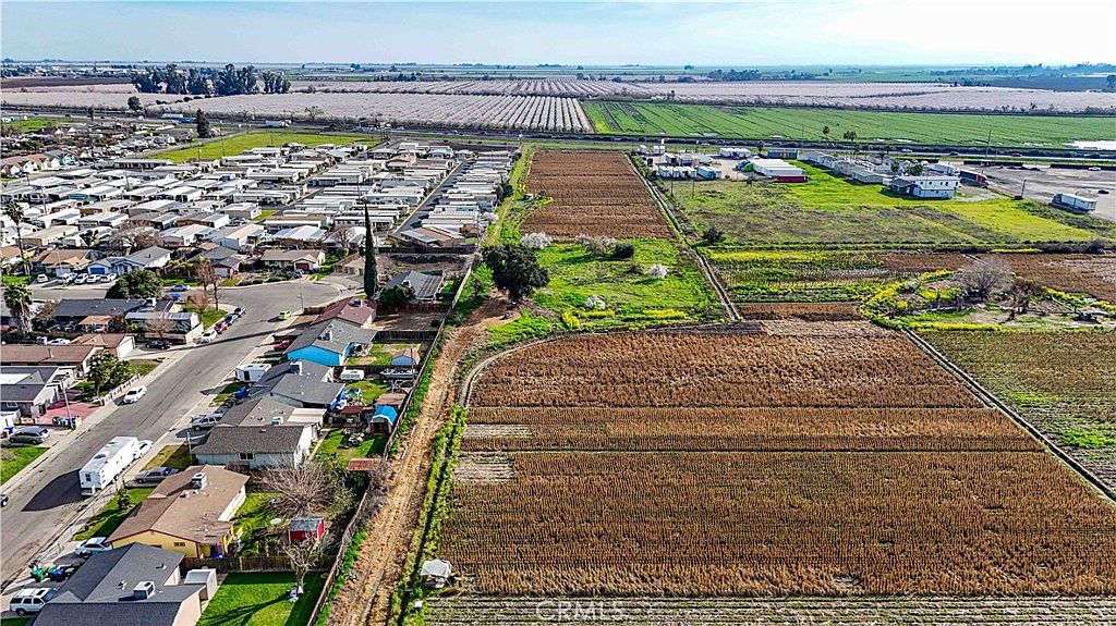 Drone perspective of the 5-acre commercial zoned portion near Highway 99