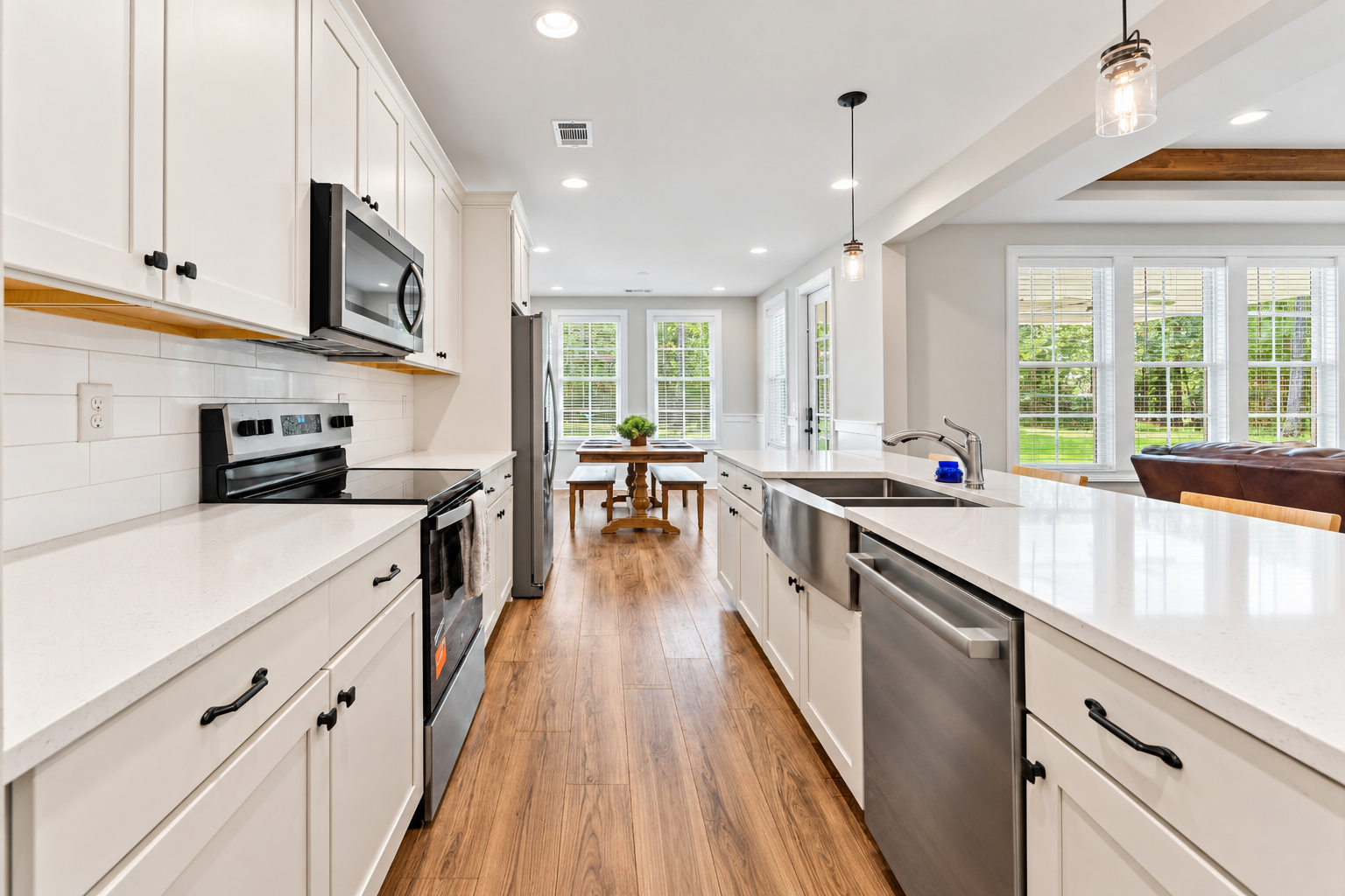 Bright modern farmhouse kitchen with island at 1537 Dartmouth Dr, Auburn AL