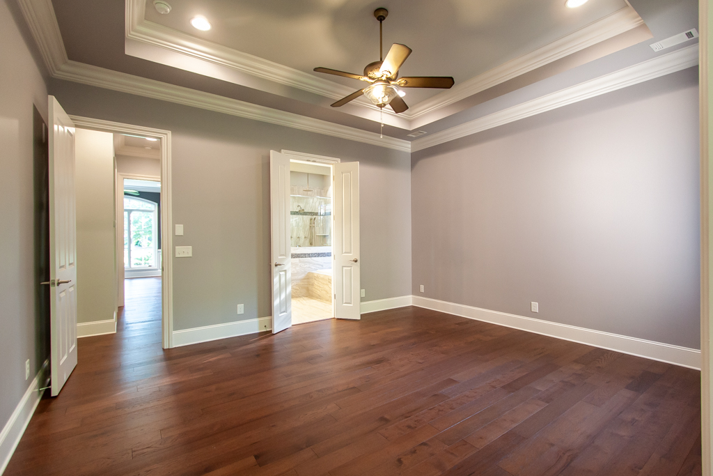 Living room with coffered ceiling and abundant natural light