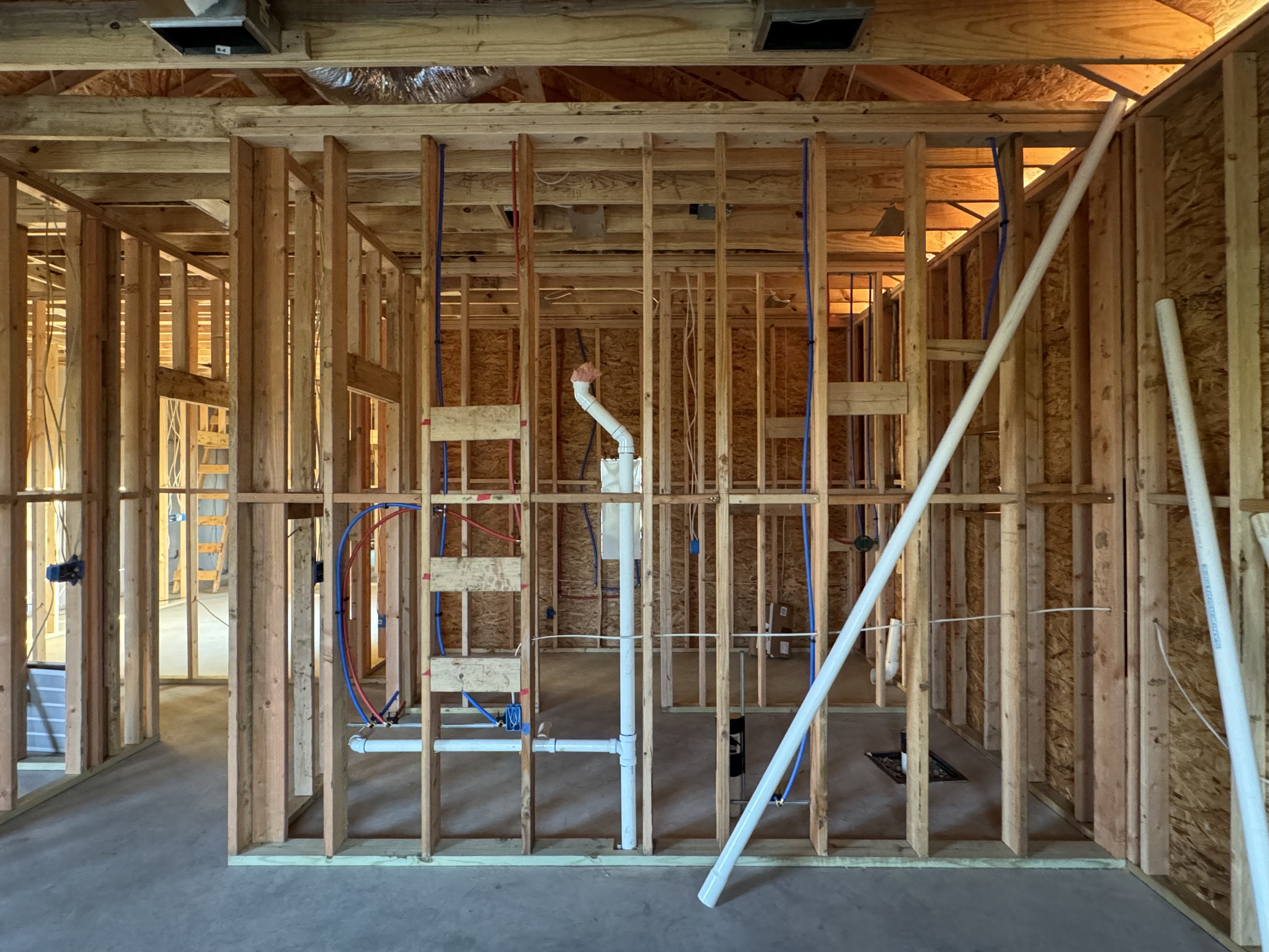 Interior rough-in construction showing framing and mechanical work