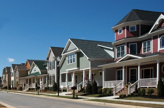 Residential street with houses in The Villages of Apex, Apex NC
