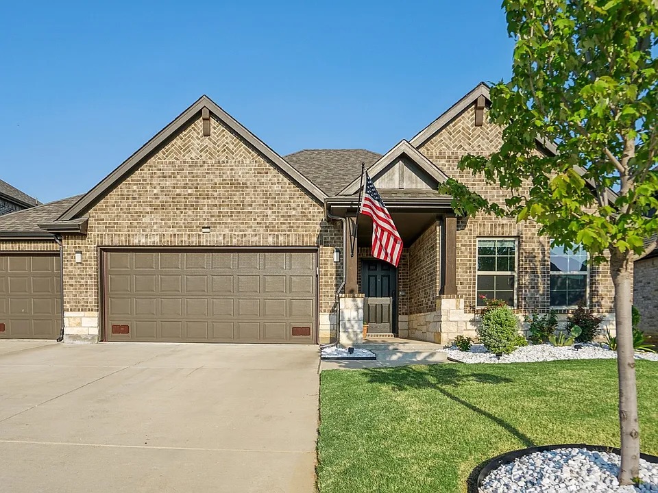 Exterior front view of 4118 Mountain Laurel Drive — a home in the Sycamore Cove community
