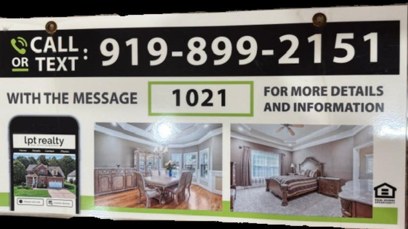 Custom yard sign for a real estate listing with LPT Realty branding