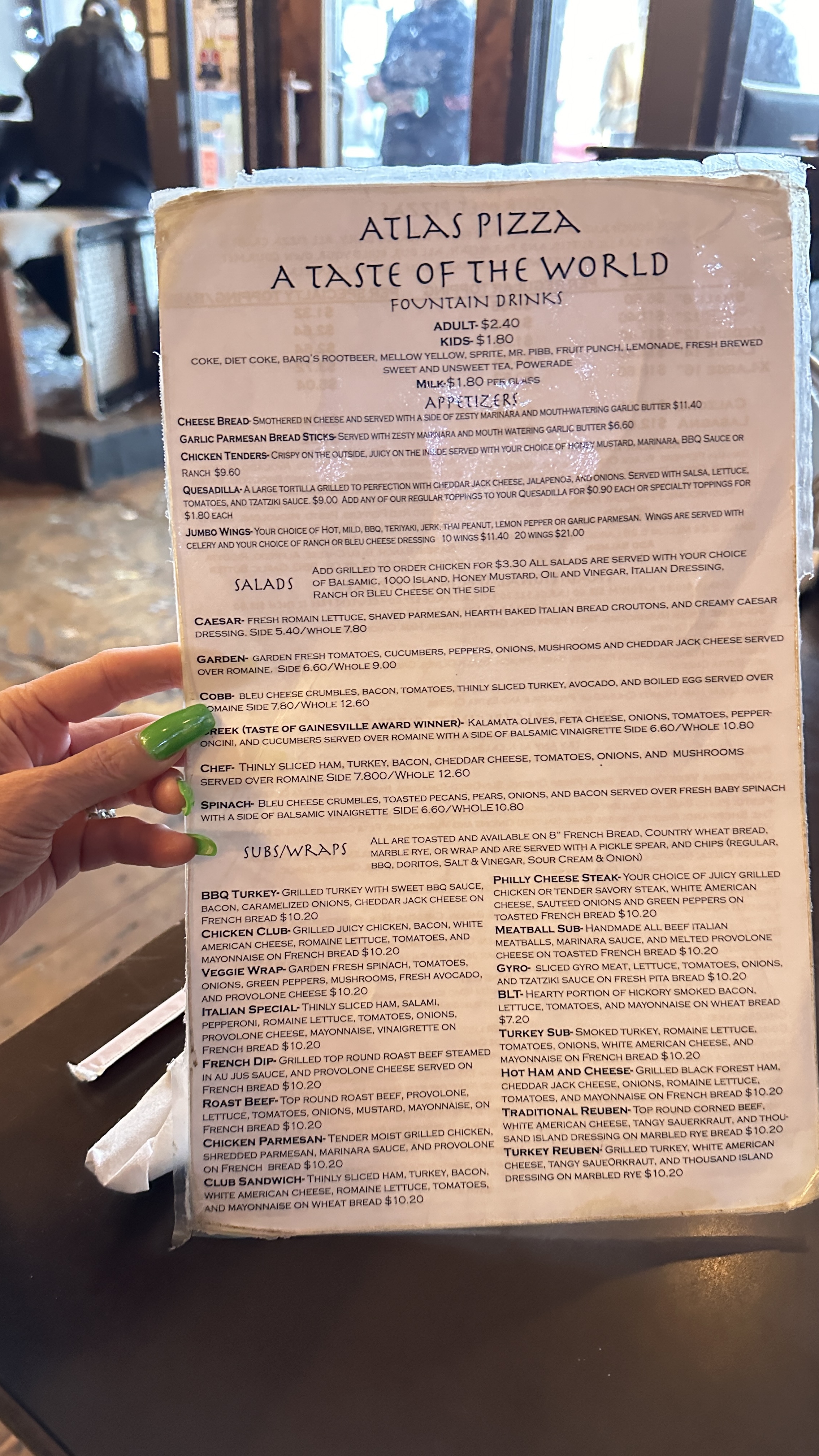 Atlas Pizza menu with pizza and wine selections in Gainesville Georgia
