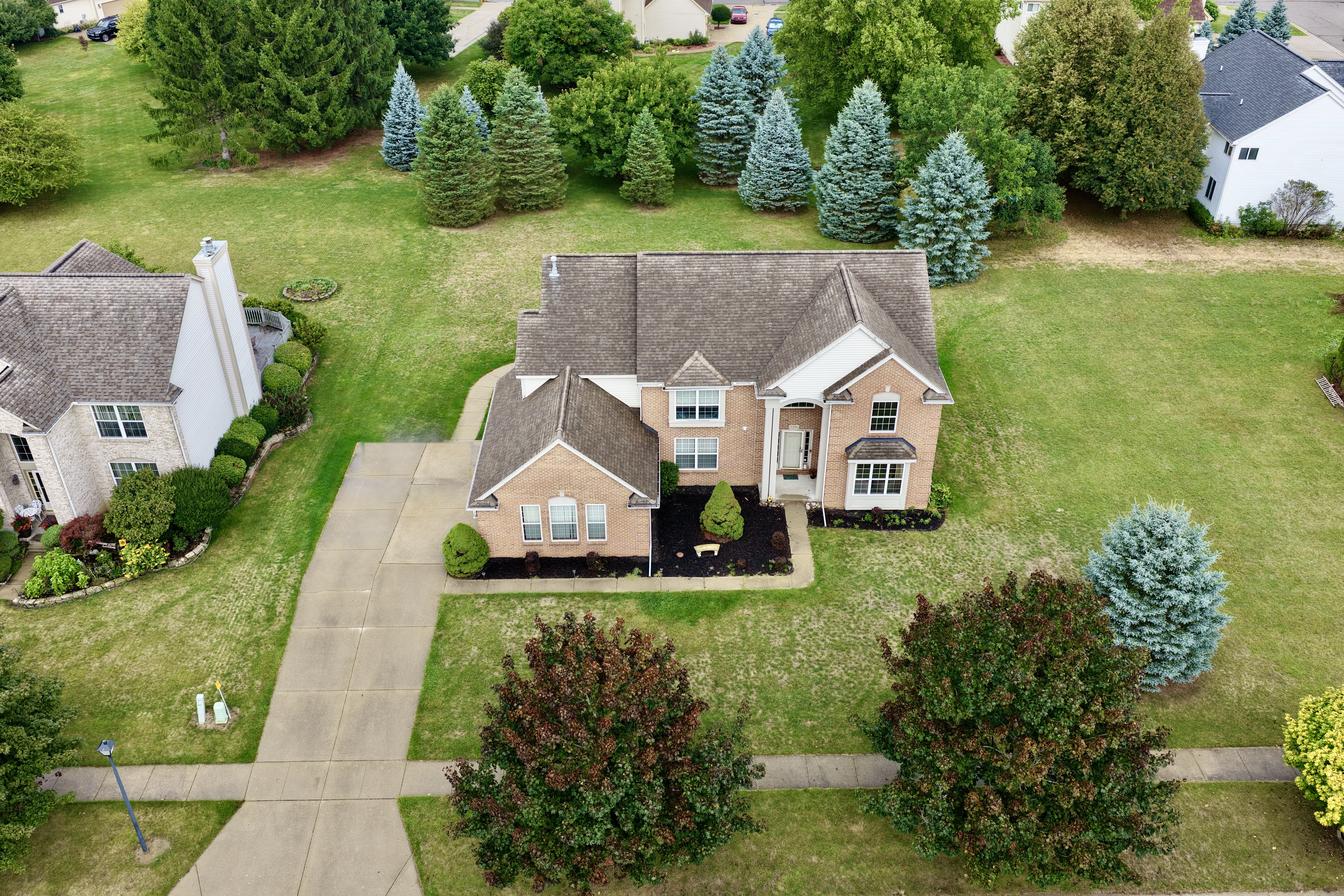 Drone view of the home at 2295 Hidden Forest Drive, Grand Blanc, Michigan