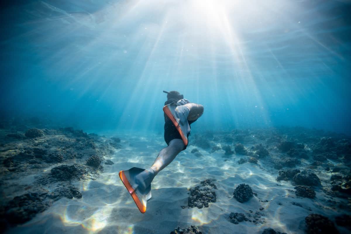 Snorkeler exploring shallow coral formations at Looe Key National Marine Sanctuary near Big Pine Key