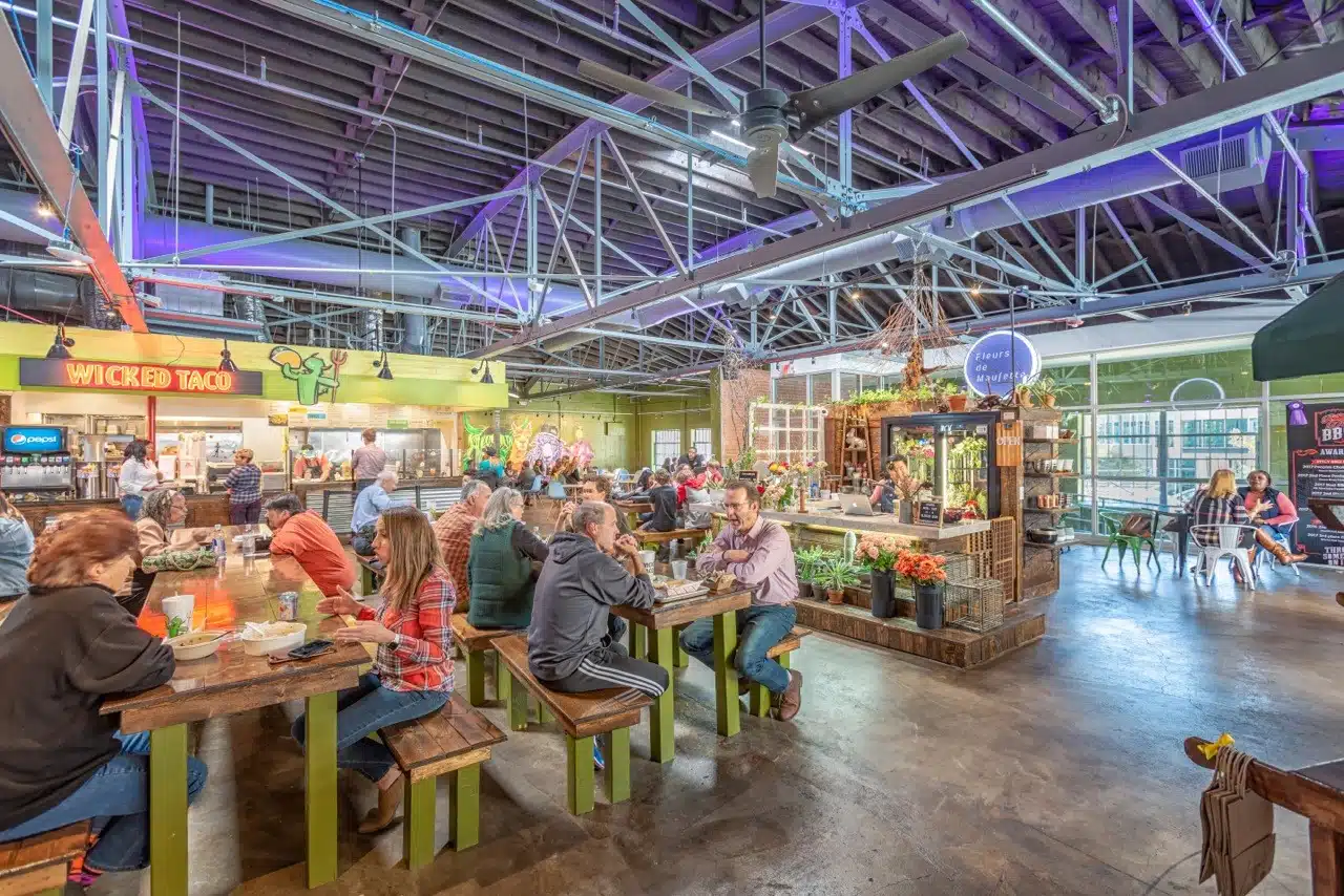 People dining at Morgan Street Food Hall in downtown Raleigh