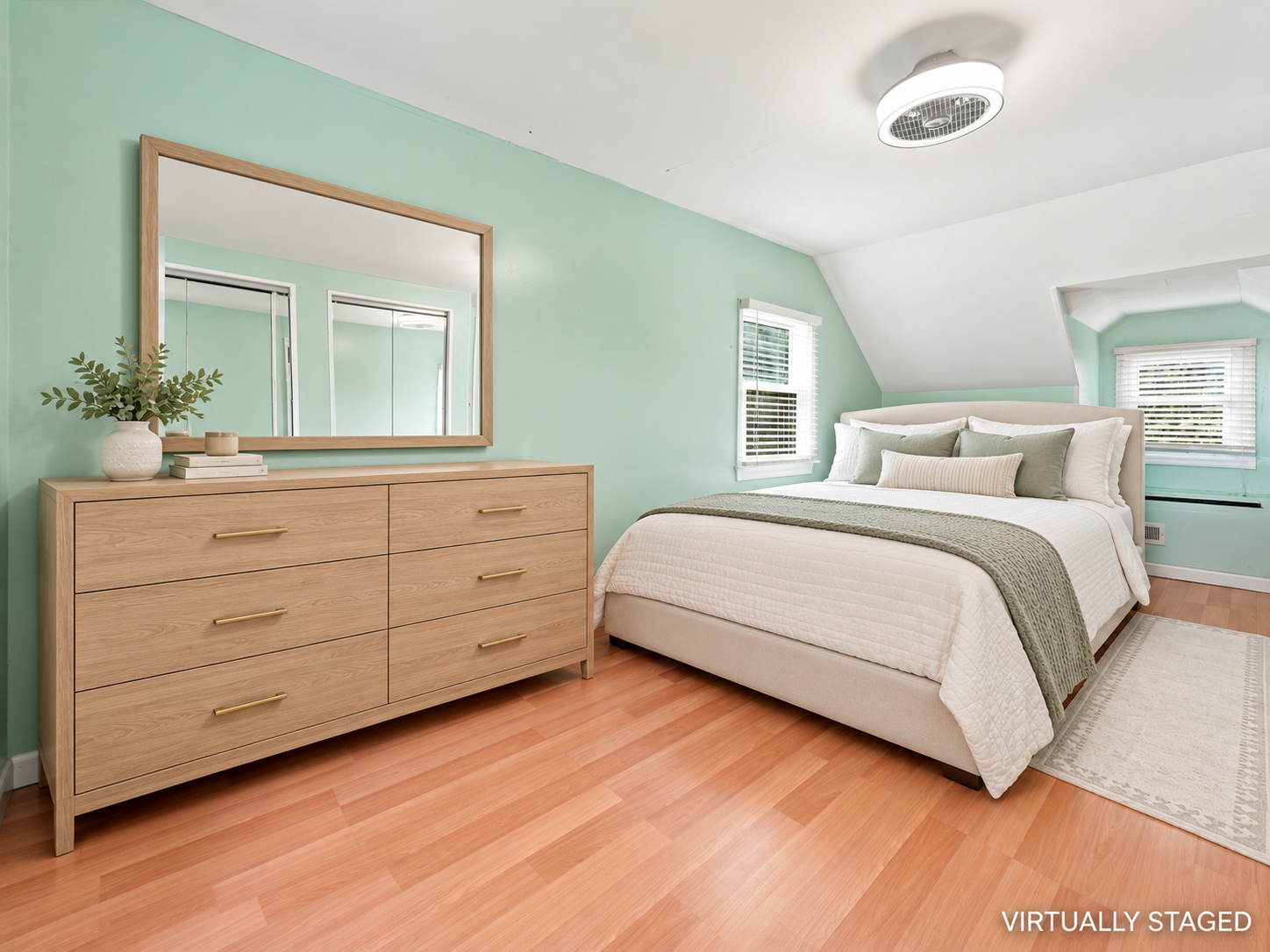Primary bedroom at 50 Heather Ln, virtually staged with furnishings