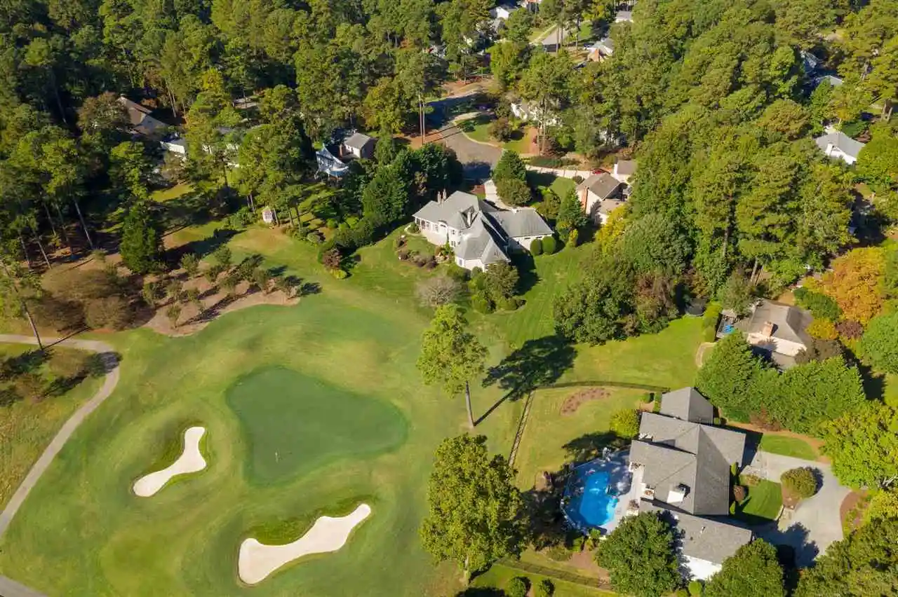 North Ridge neighborhood in North Raleigh with golf course and homes under a mature tree canopy