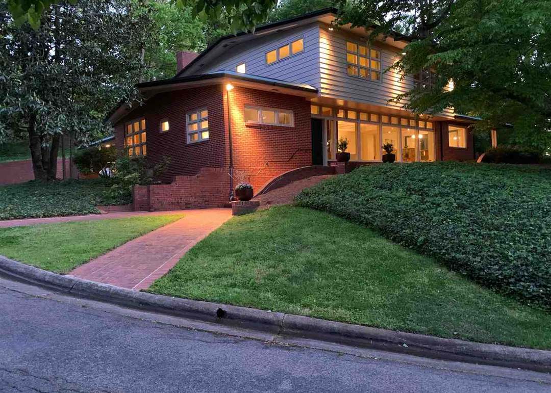Traditional single-family home on a tree-lined street in Forest Hills, Durham, North Carolina