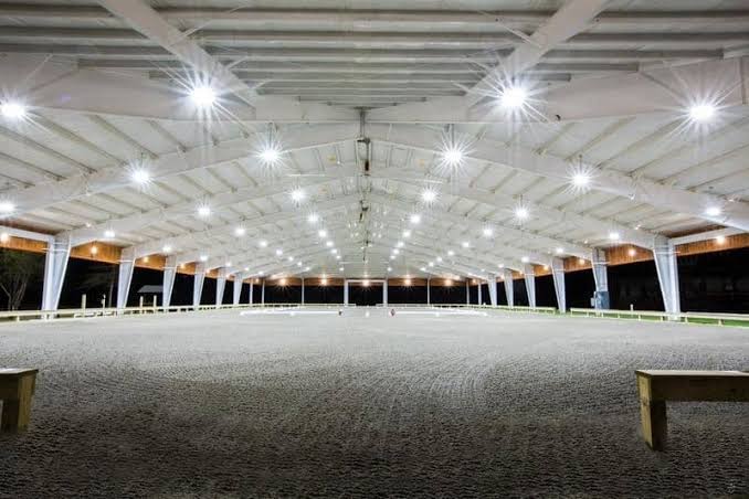 Equestrian center at Portofino at night with warm lighting