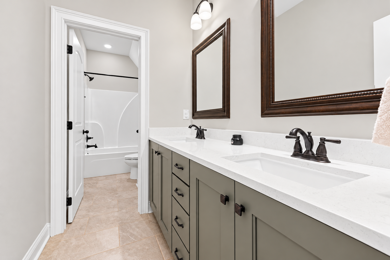 Bright modern sage vanity bathroom at 1537 Dartmouth Dr, Auburn AL