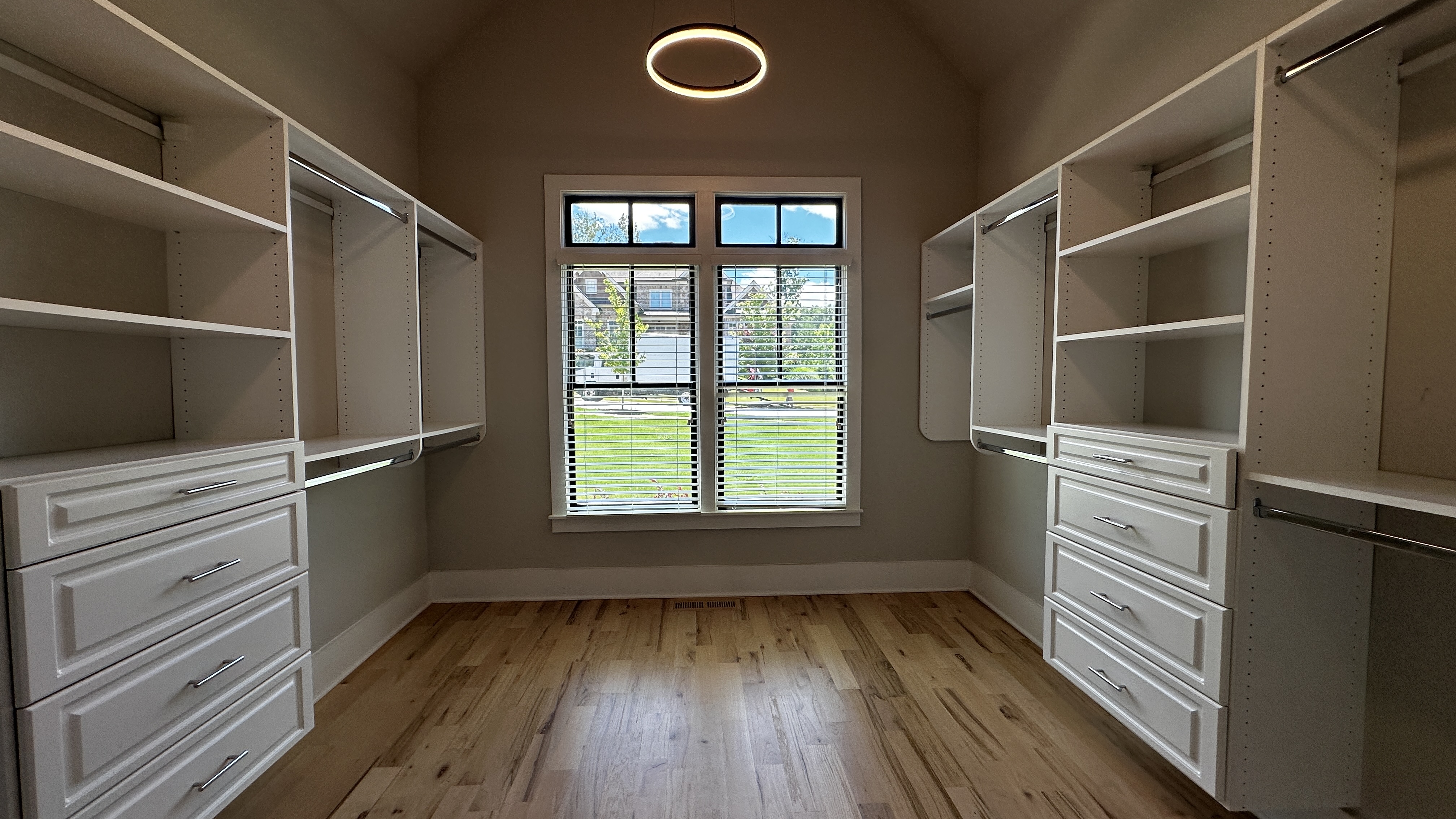 Bathroom at 5760 Lula Bridge Ct with shiplap walls and soaking tub