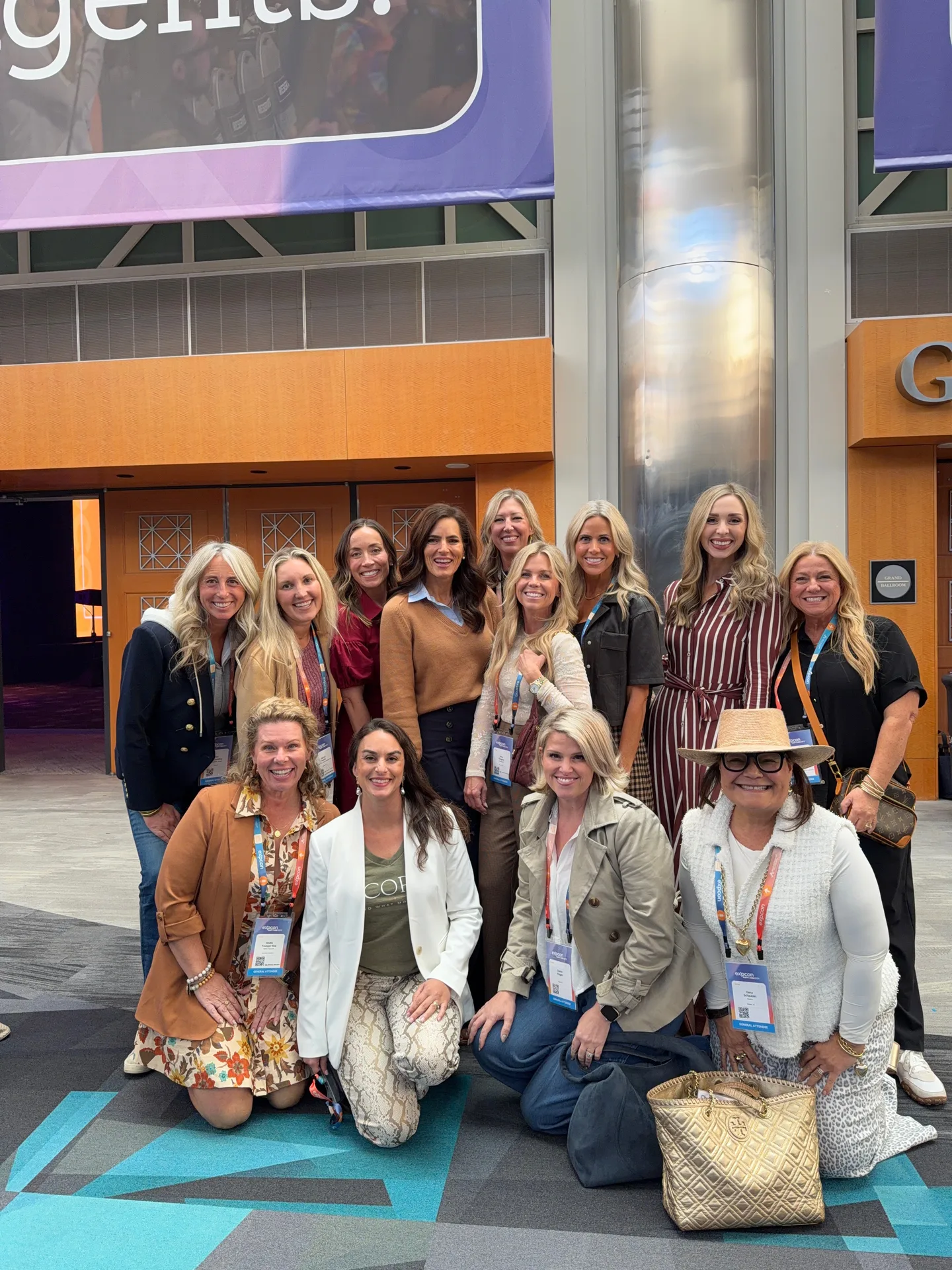 A real estate team group photo at a conference