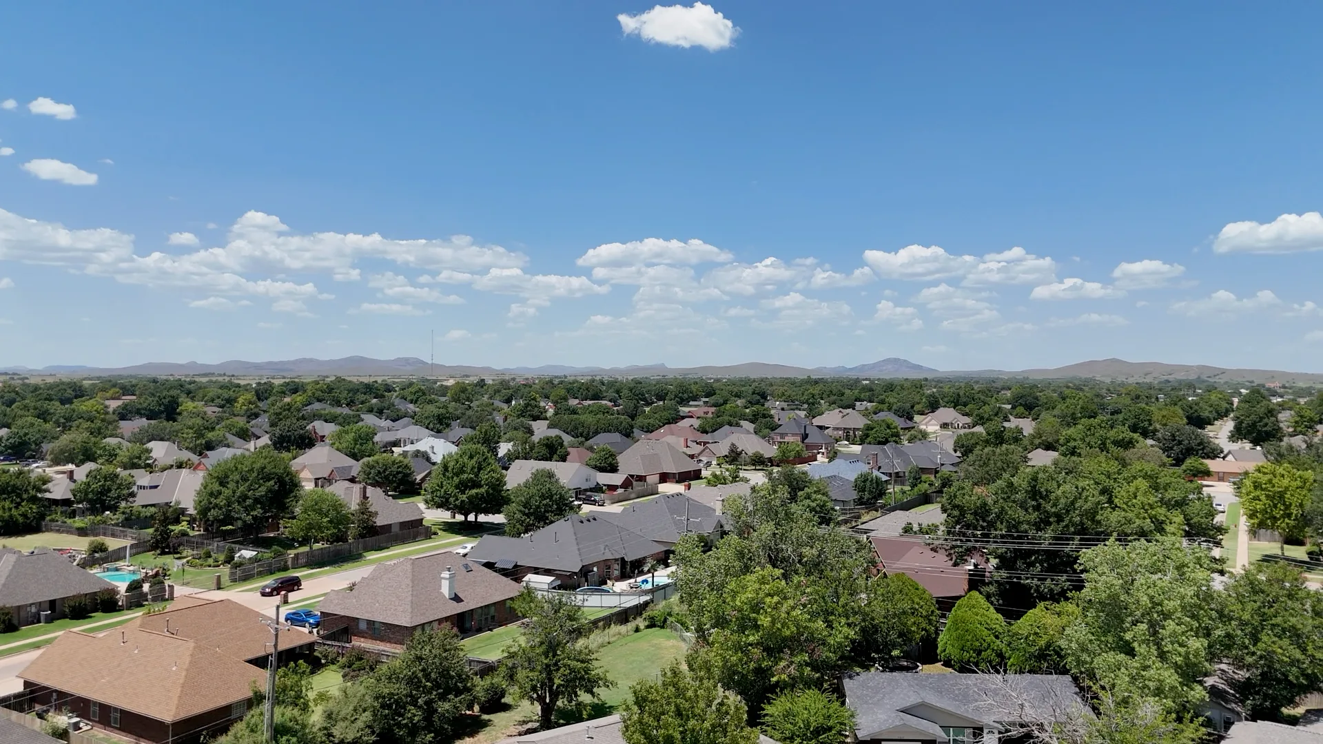 Aerial view of Lawton, Oklahoma with the Wichita Mountains rising in the background on a clear day